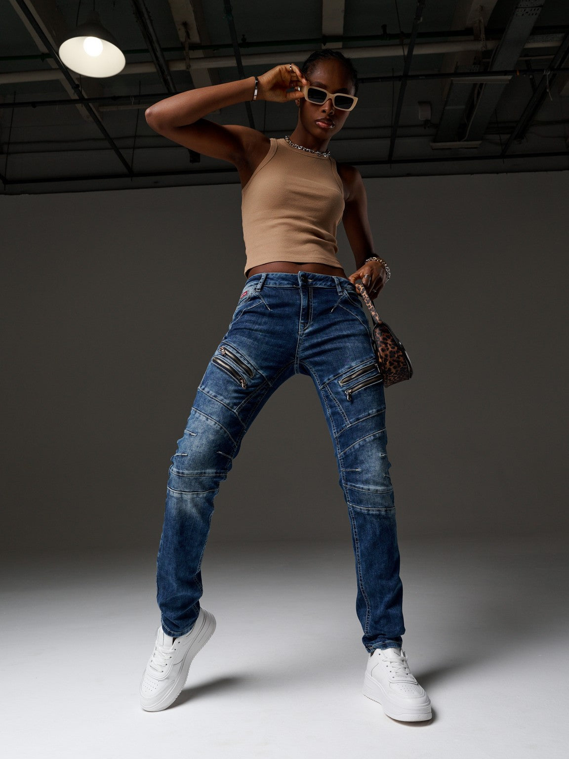 WD501 Women's Slim-fit Jeans with decorative stitching, zippers and brand logo